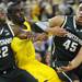 Michigan junior Tim Hardaway Jr. battles Michigan State sophomore Branden Dawson and freshman Denzel Valentine during a free throw against Michigan State in the first half at Crisler Center on Sunday, March 3, 2013. Melanie Maxwell I AnnArbor.com